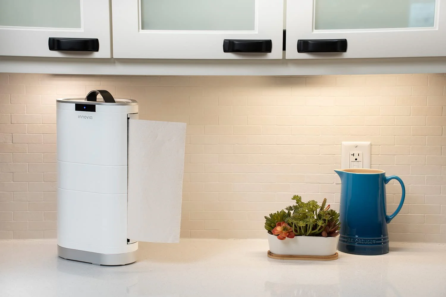 Innovia touchless paper towel dispenser for the worktop in white