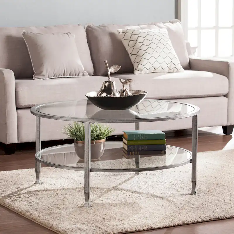 Glenn Distressed Silver Round Coffee Table with Glass Top and Shelf by SEI Furniture