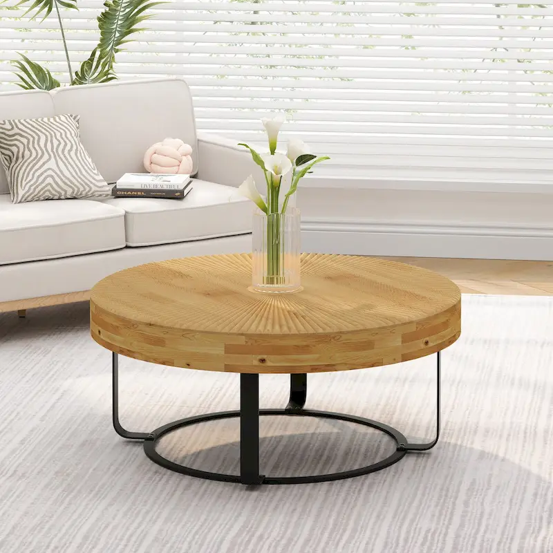 Contemporary Round Wooden Coffee Table with Intricate Carving and Metal Legs