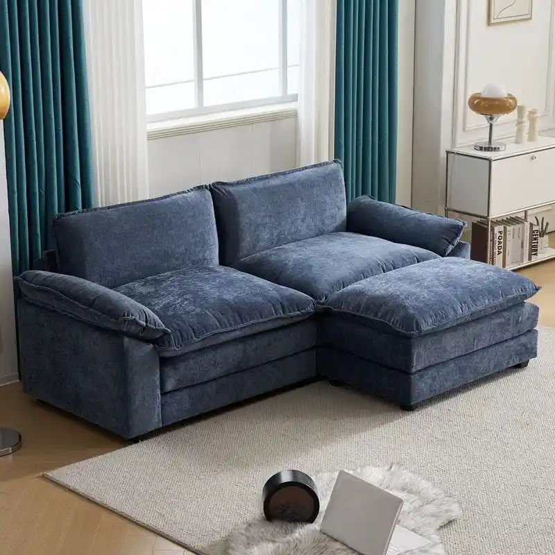 Reversible Sectional Sofa with Ottoman and Cushioned Seating