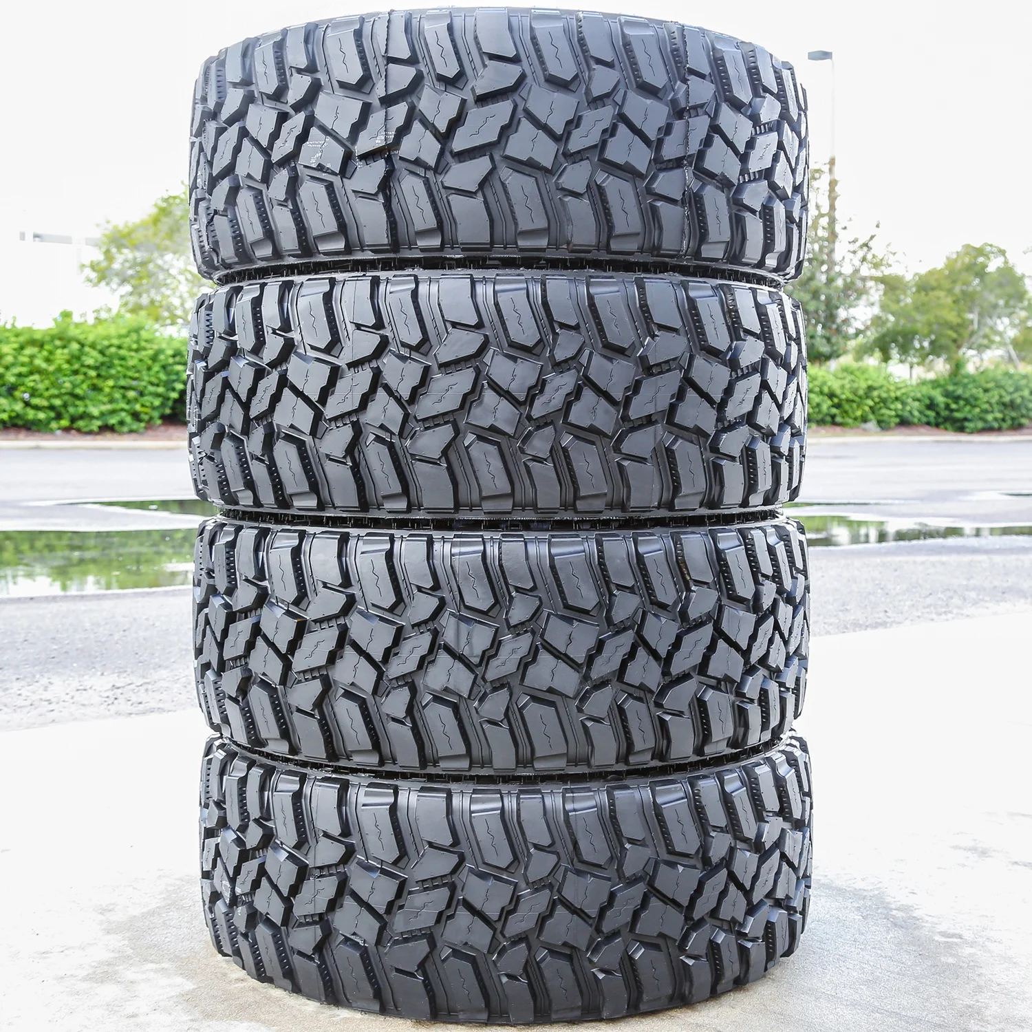 Set of 4 Cooper Discoverer STT Pro 285/75R16 126/123Q E 10 Ply m/t mud Light Truck Tires