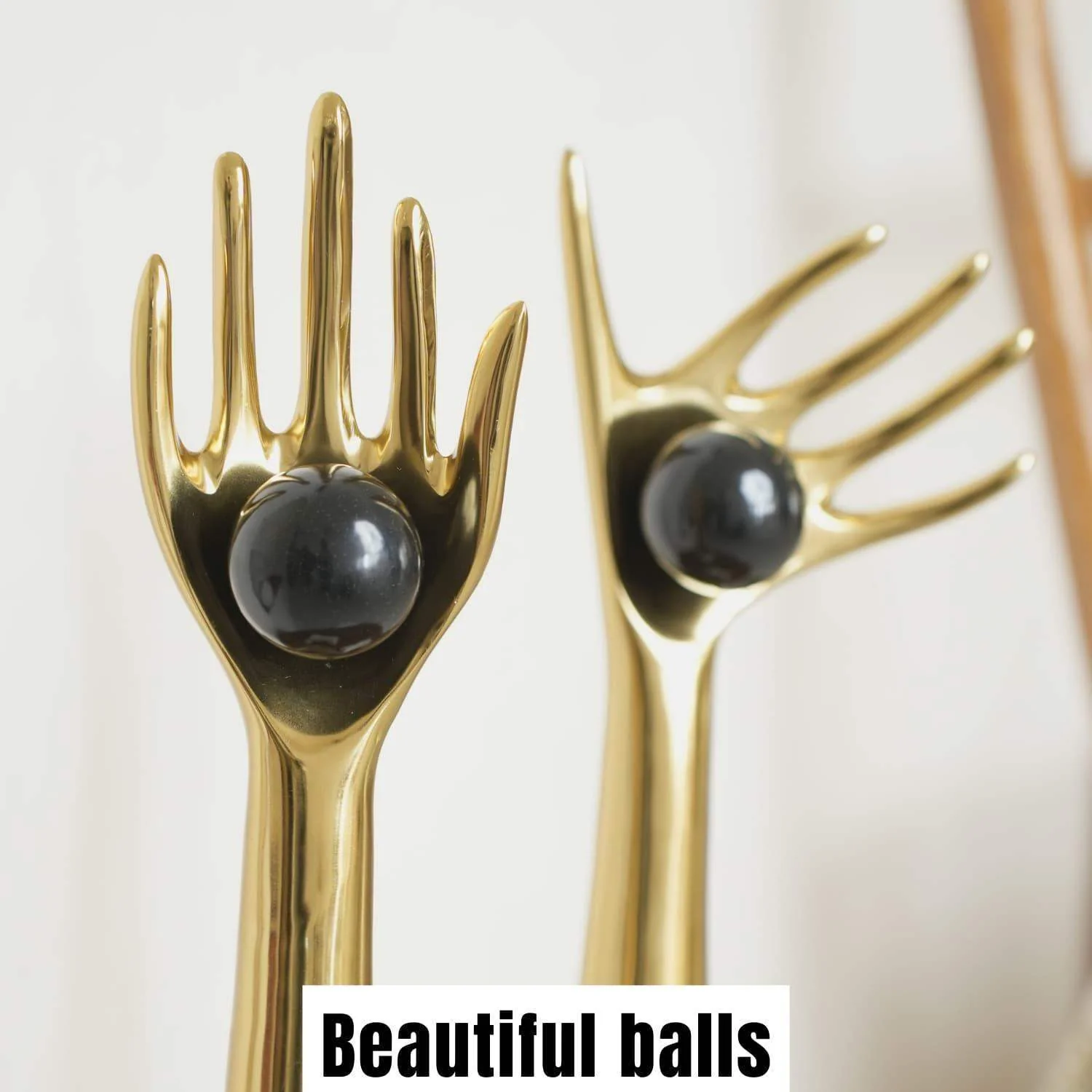 The Golden auspicious hands holding balls in aluminum set of 2