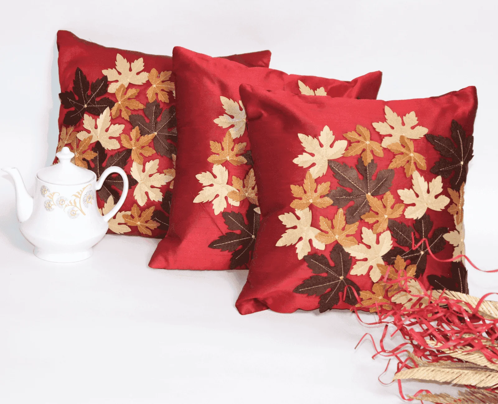 The Maroon Leaf Cushion covers