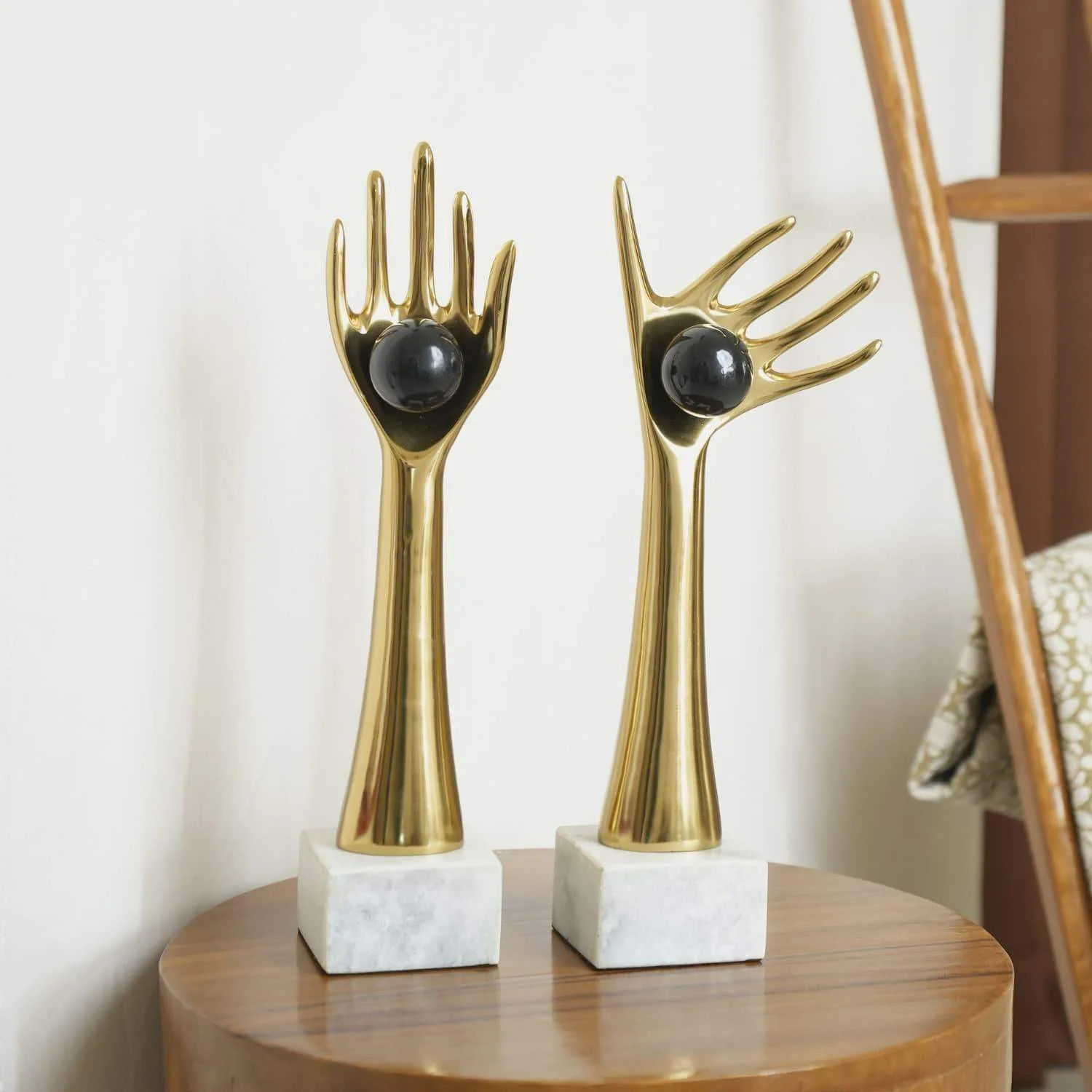 The Golden auspicious hands holding balls in aluminum set of 2