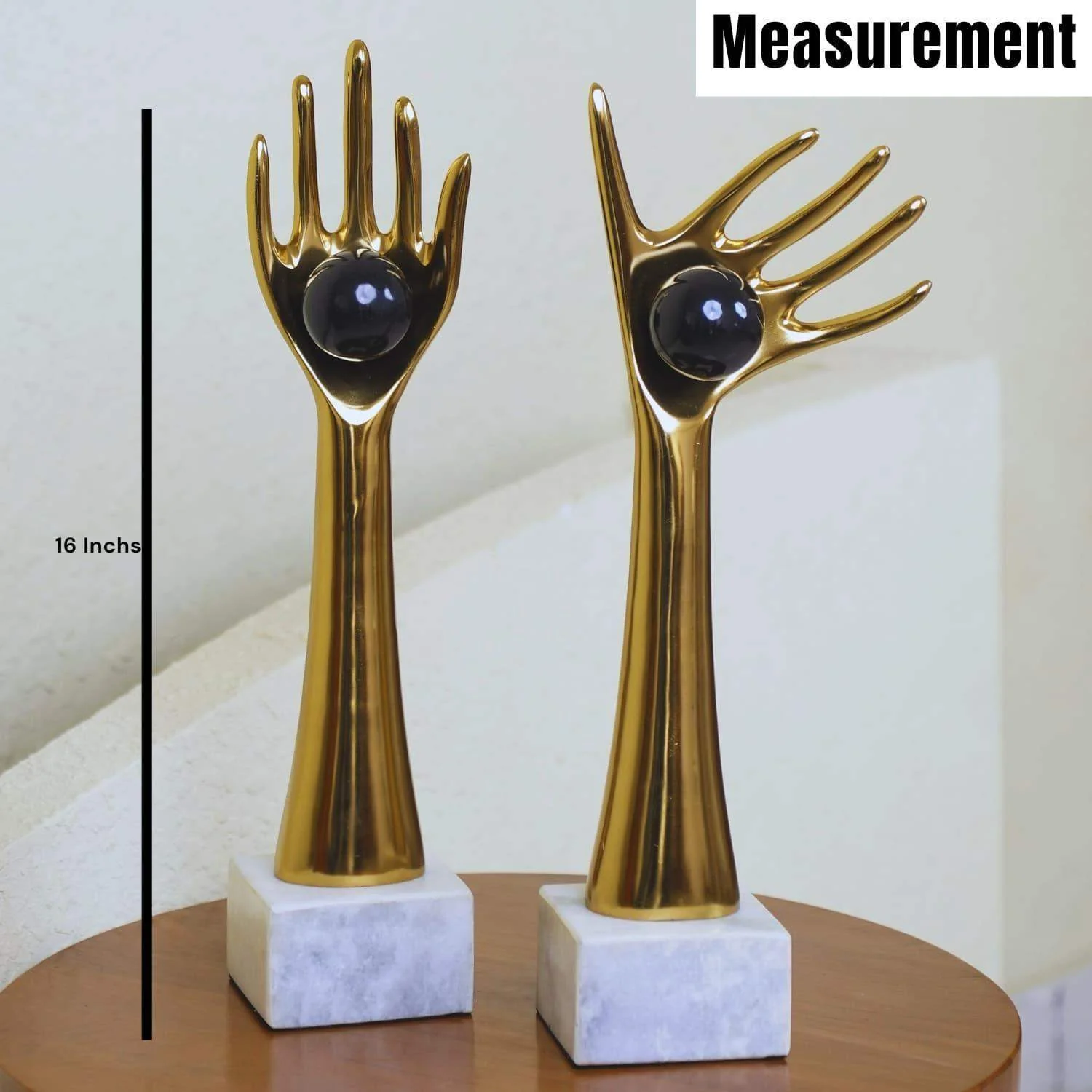 The Golden auspicious hands holding balls in aluminum set of 2