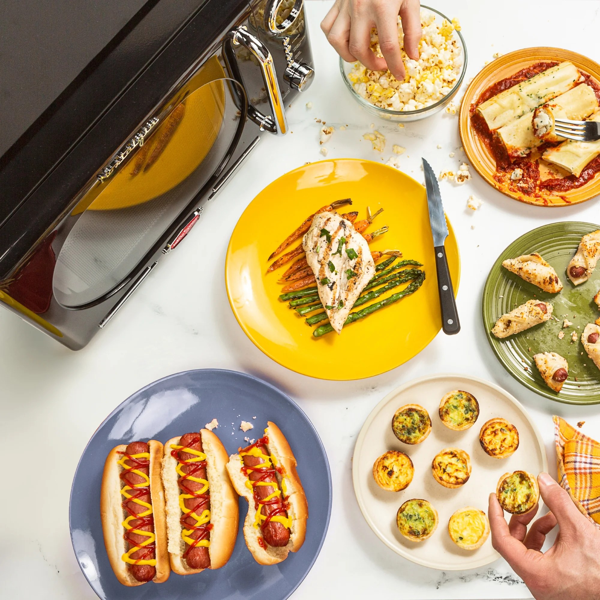 Nostalgia Retro 0.7 Cu. ft. 700-Watt Countertop Microwave Oven, Black